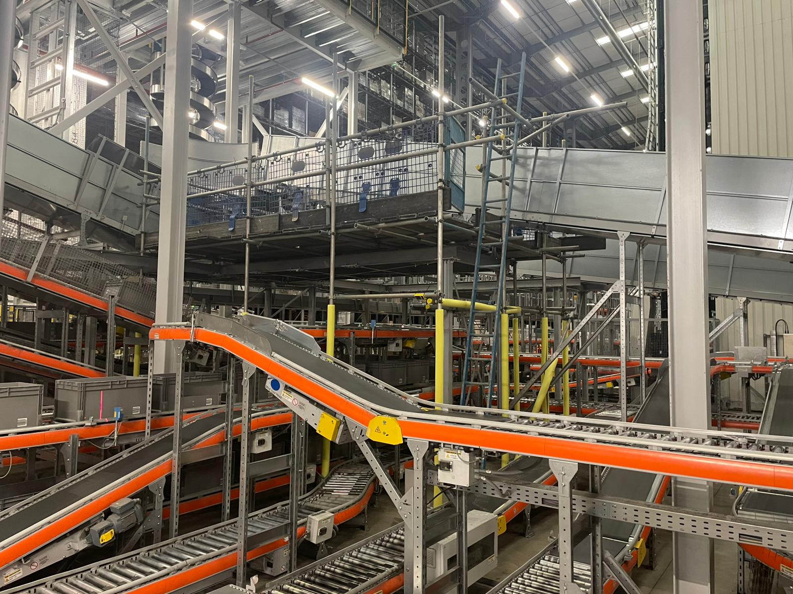 Interior scaffolding to access and repair areas of a distribution centre